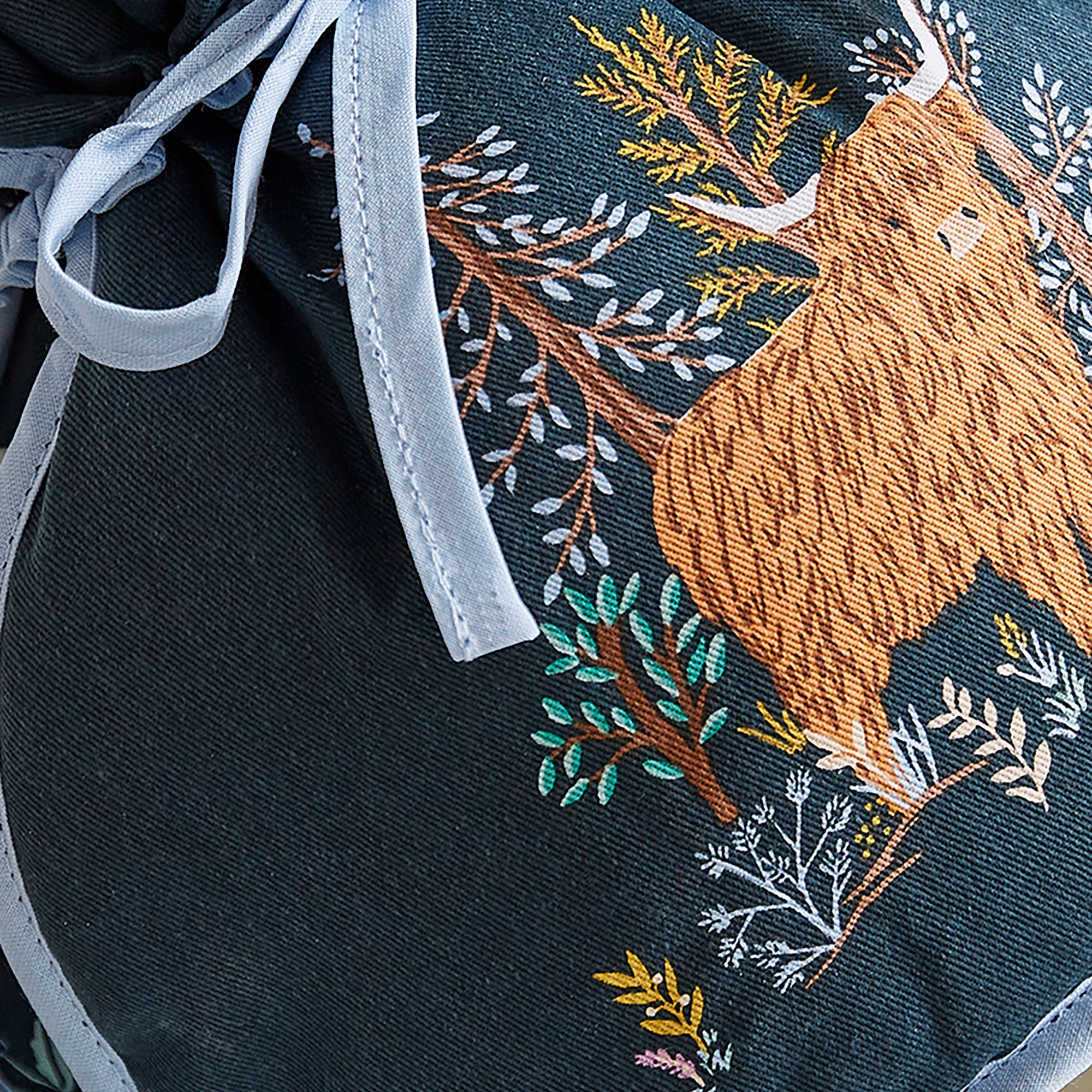 ulster-weavers-connie-the-cow-teew-rmer-muff-in-navy image 3